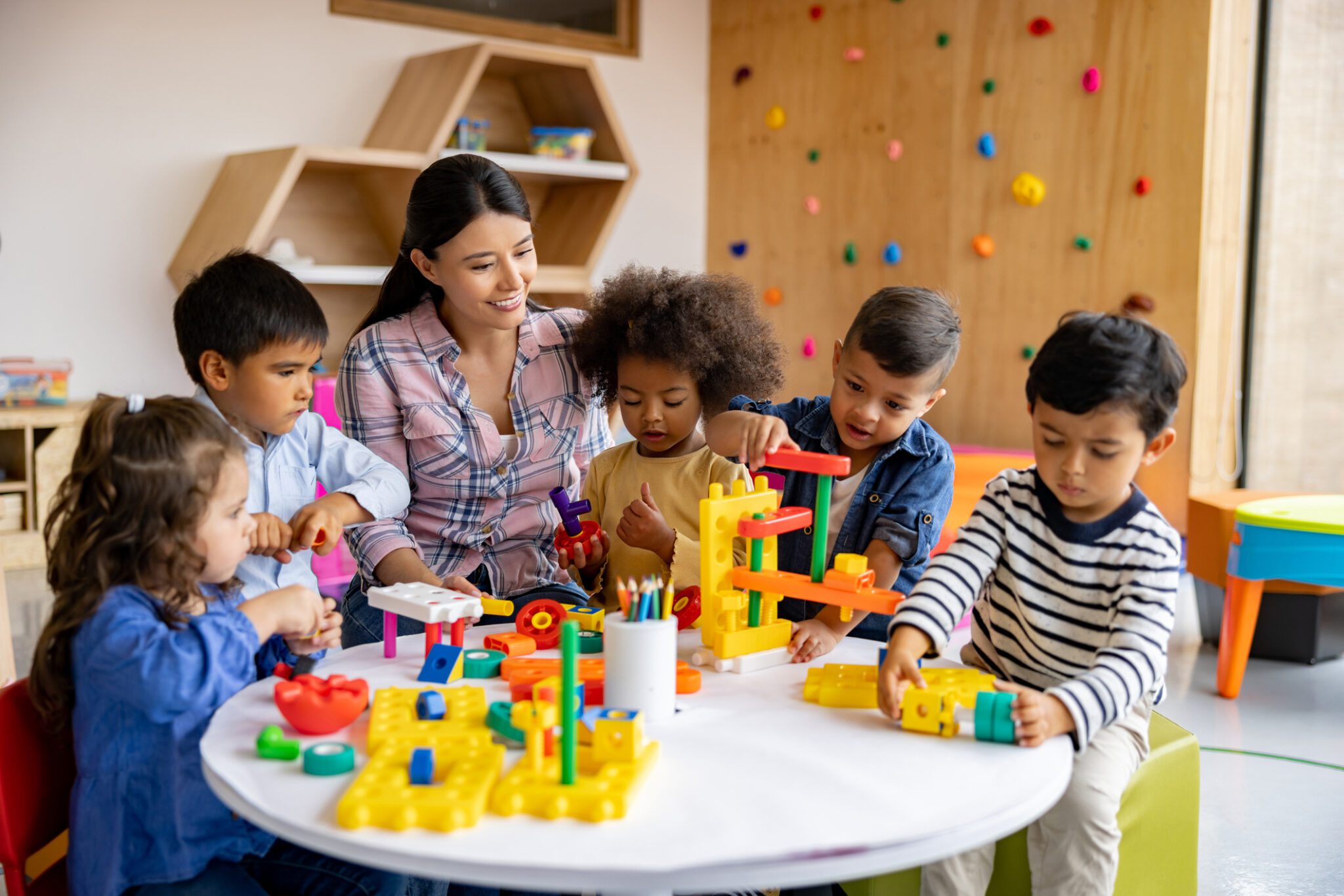 Teacher and kids enjoying creative playtime