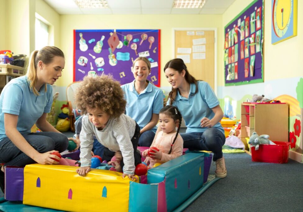 Children playing in colorful daycare room